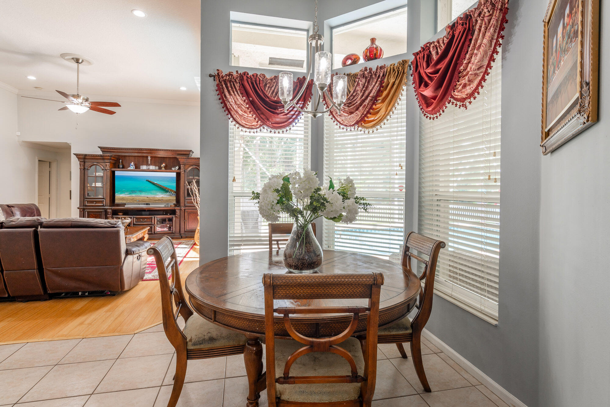 750 Cedar Cove Road Wellington, FL 33414 - Photo 13 of 37 a dining room with furniture and wooden floor