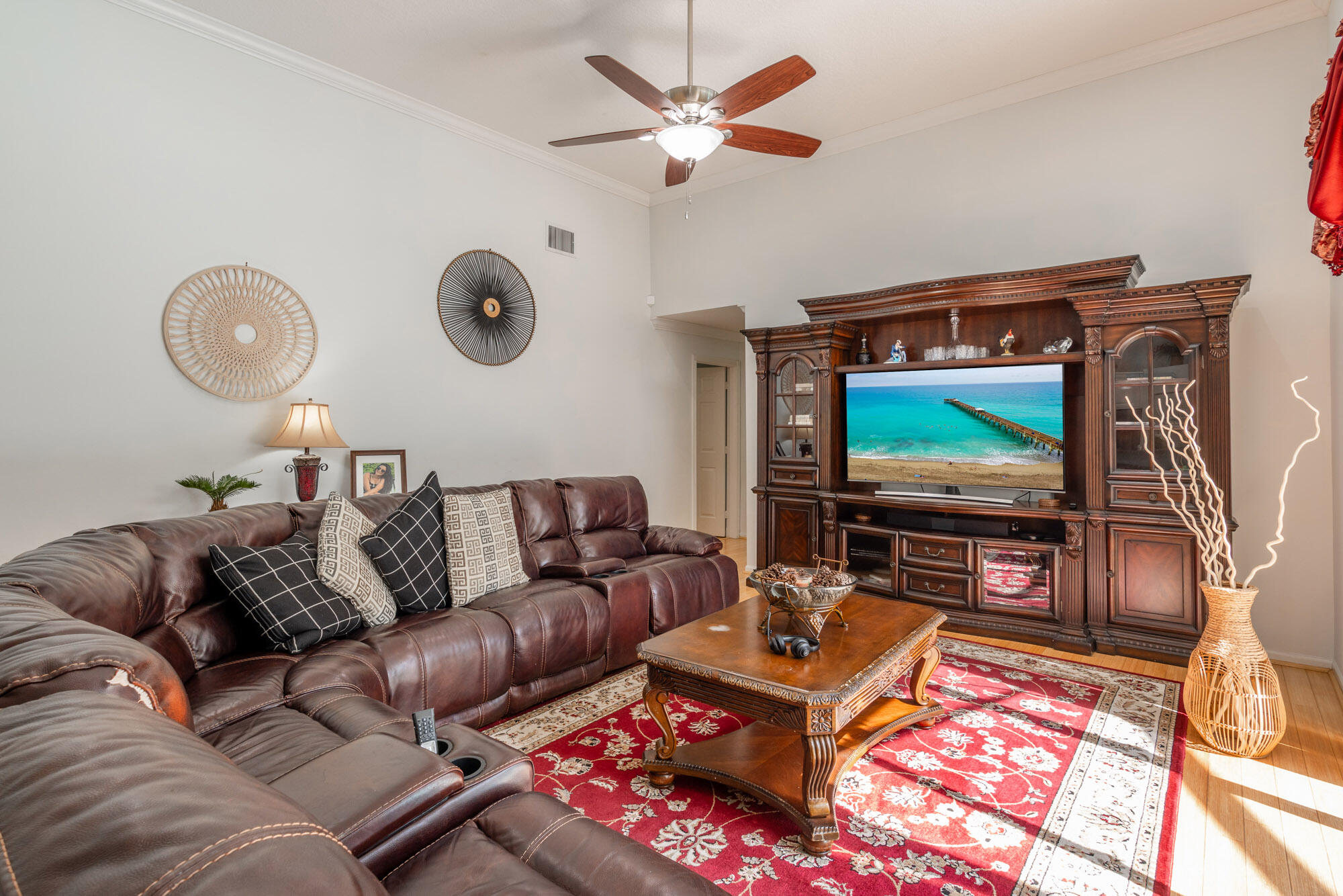 750 Cedar Cove Road Wellington, FL 33414 - Photo 15 of 37 a living room with furniture and a flat screen tv