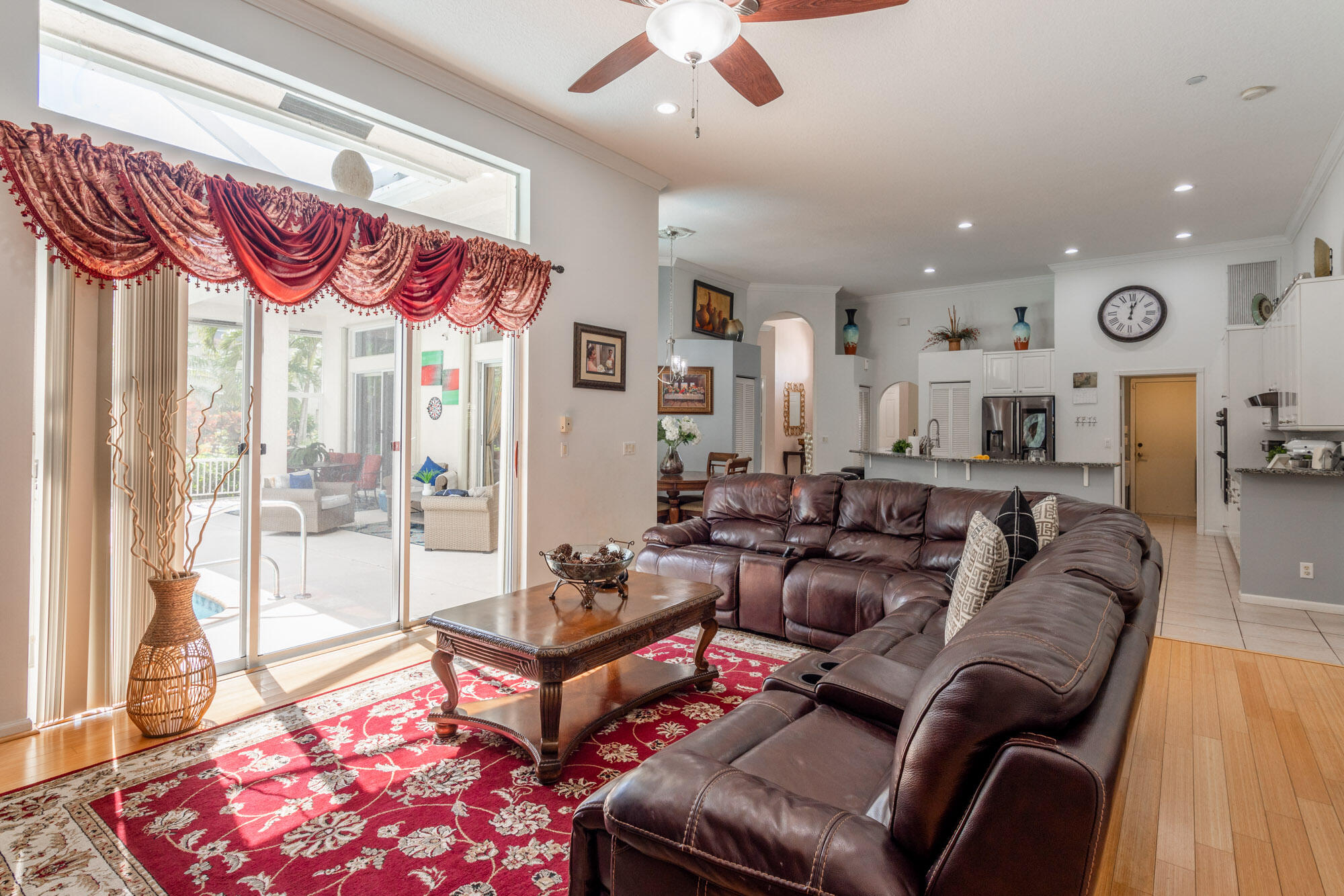 750 Cedar Cove Road Wellington, FL 33414 - Photo 16 of 37 a living room with furniture and a large window
