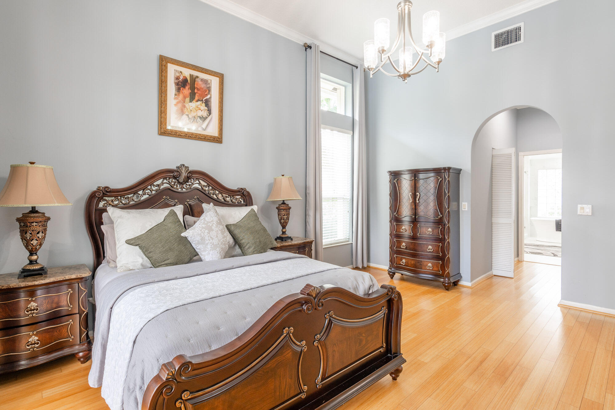 750 Cedar Cove Road Wellington, FL 33414 - Photo 18 of 37 a bedroom with bed and a window