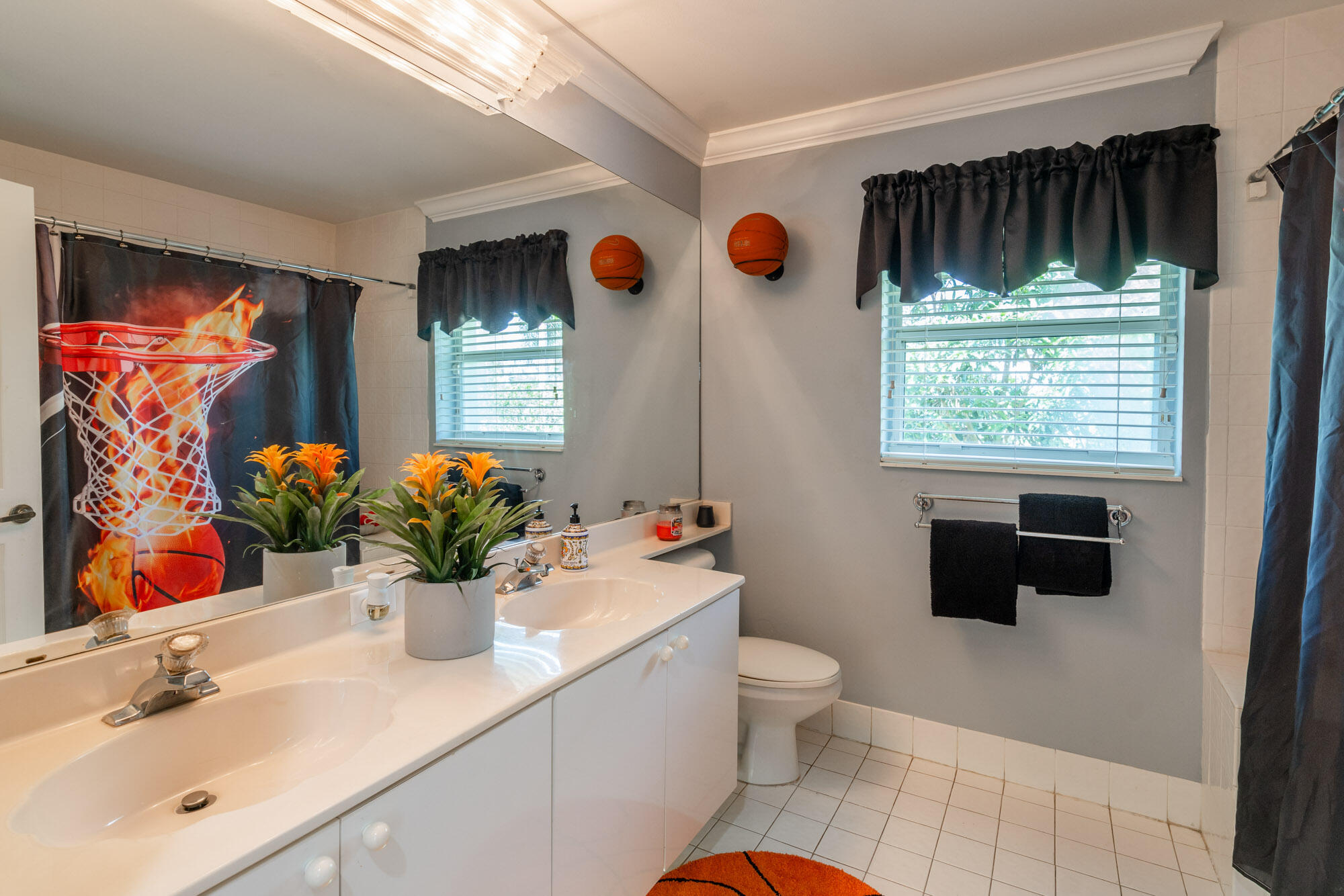 750 Cedar Cove Road Wellington, FL 33414 - Photo 24 of 37 a bathroom with a sink mirror vanity and toilet