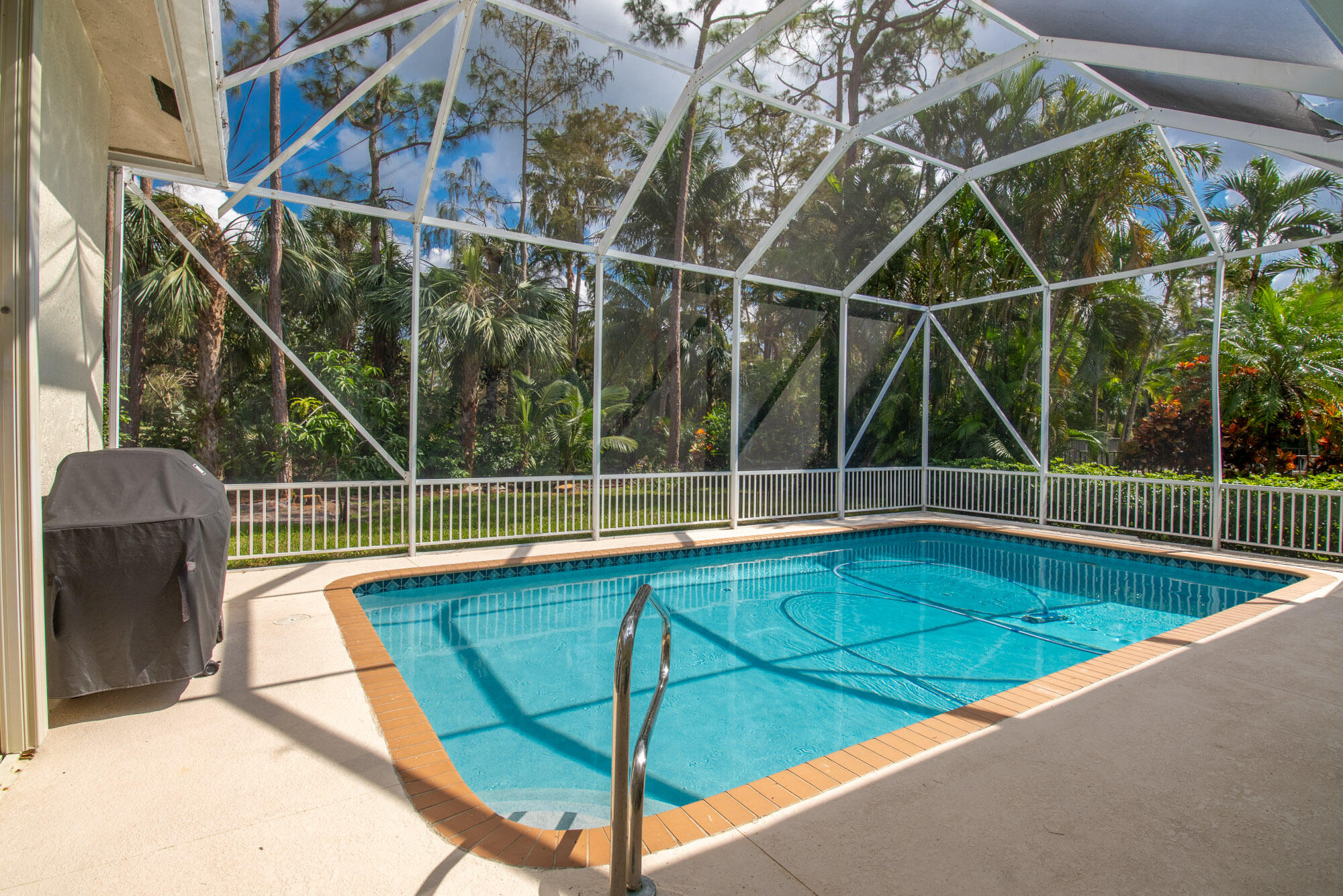 750 Cedar Cove Road Wellington, FL 33414 - Photo 28 of 37 a view of a backyard