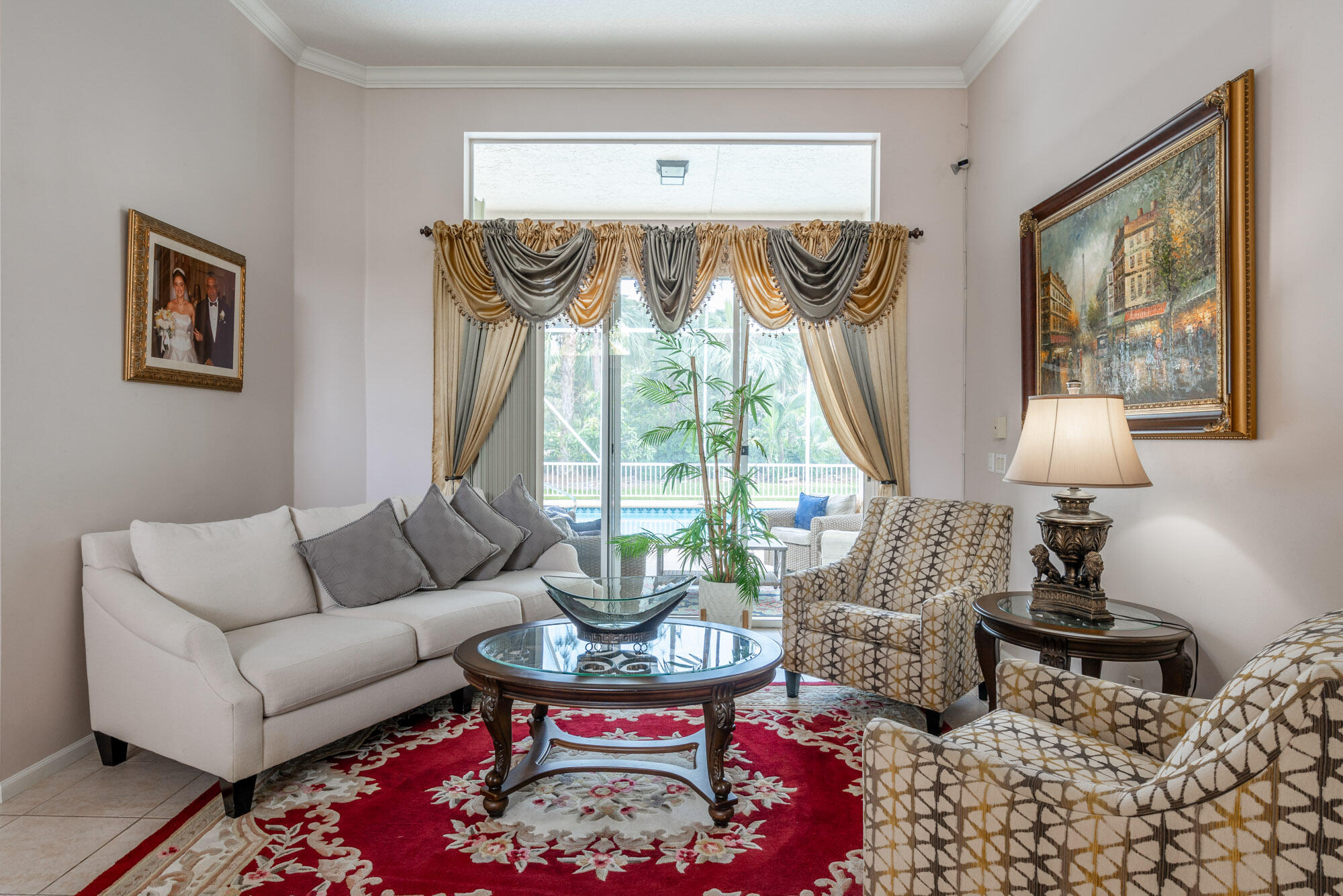 750 Cedar Cove Road Wellington, FL 33414 - Photo 4 of 37 a living room with furniture and a large window