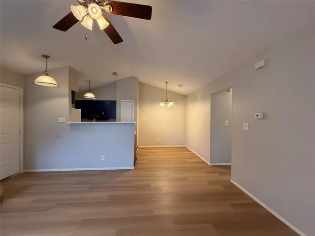 a view of a kitchen with a dishwasher and cabinets