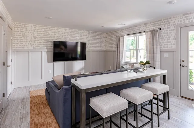 a view of a livingroom with furniture