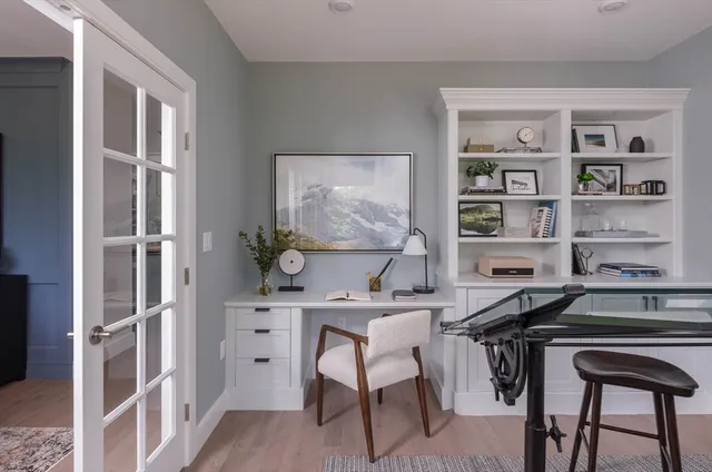 a view of a workspace with furniture