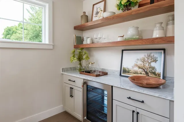a kitchen with a stove and cabinets
