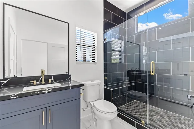 a bathroom with a sink and a window