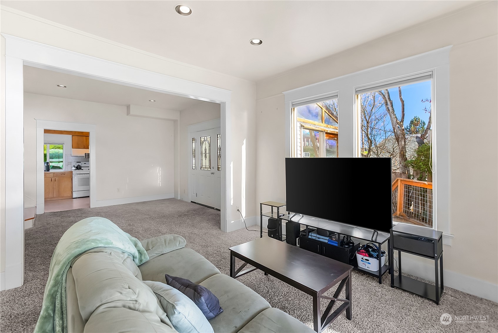 315 Shore Drive Bremerton, WA 98310 - Photo 15 of 38 a living room with furniture and a flat screen tv
