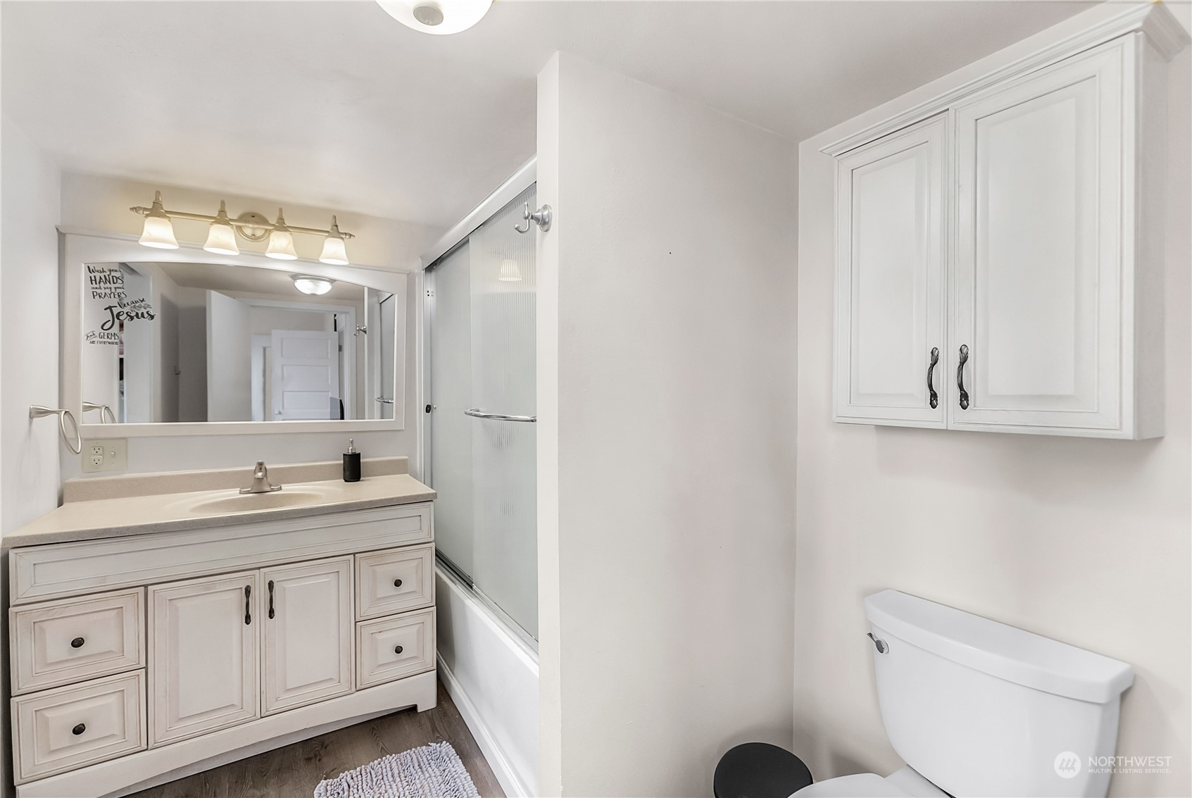 315 Shore Drive Bremerton, WA 98310 - Photo 20 of 38 a spacious bathroom with a granite countertop sink mirror and toilet