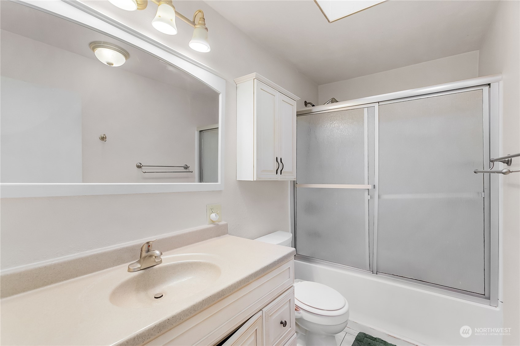 315 Shore Drive Bremerton, WA 98310 - Photo 25 of 38 a bathroom with a sink a toilet and shower