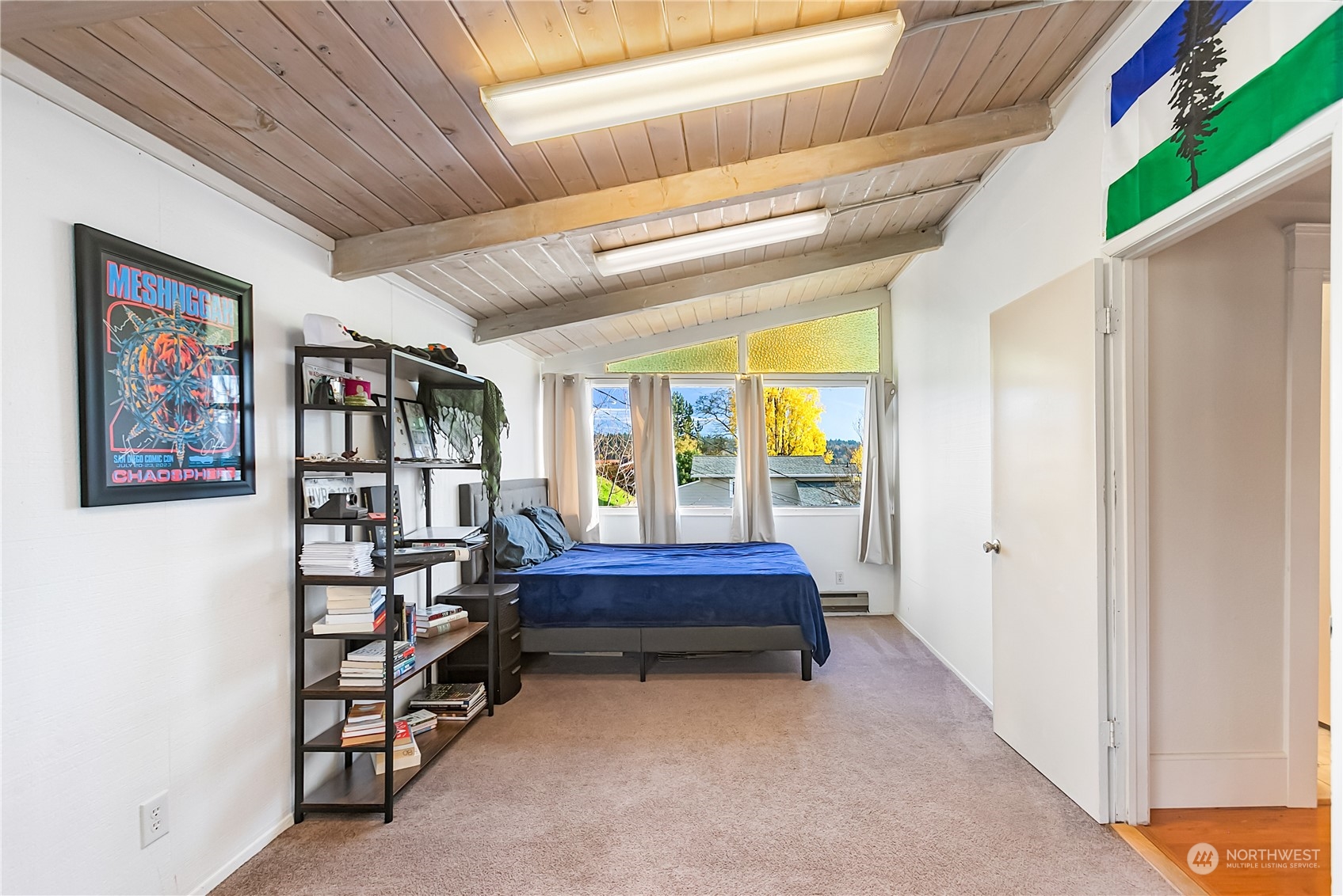 315 Shore Drive Bremerton, WA 98310 - Photo 26 of 38 a bedroom with furniture and a book shelf
