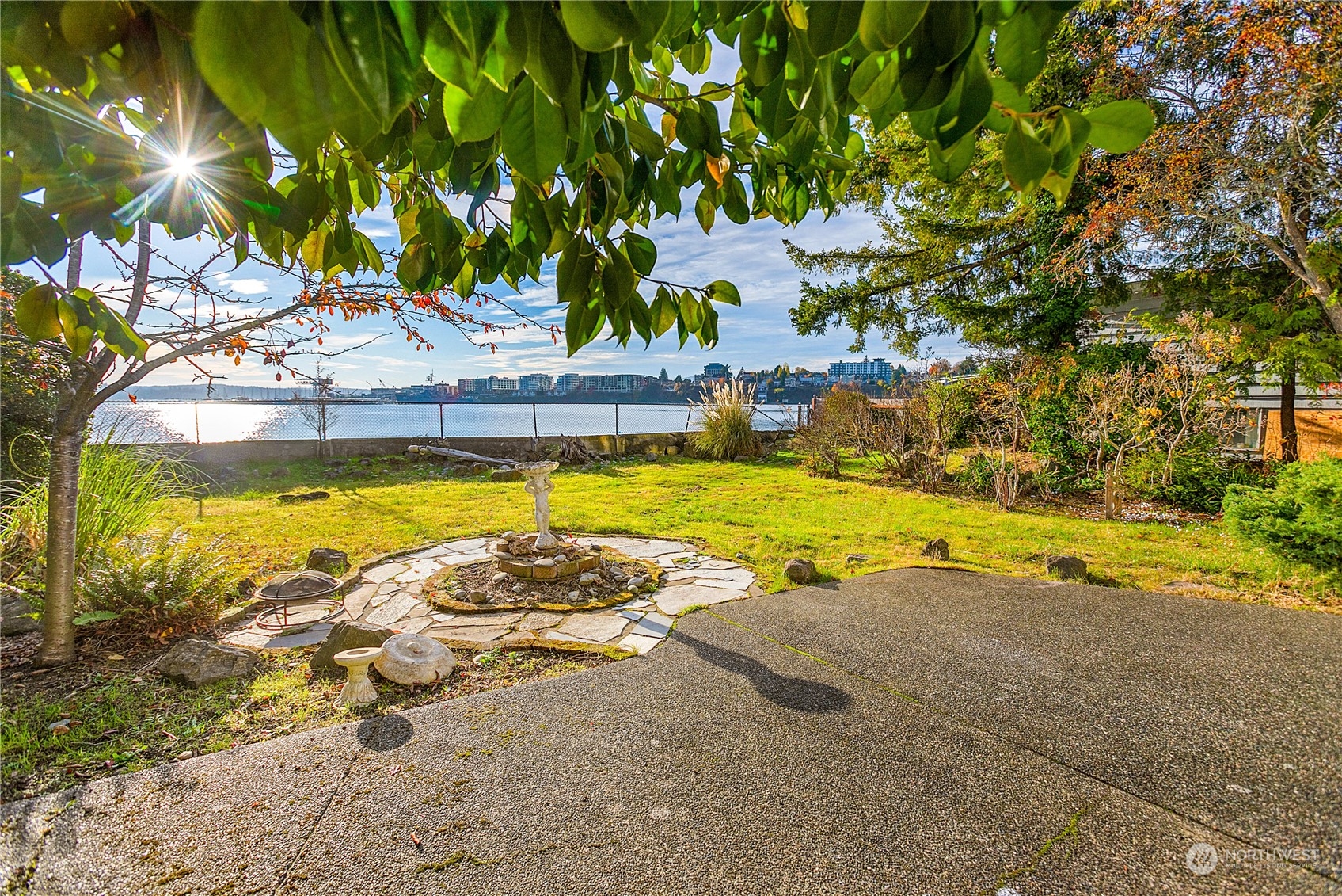 315 Shore Drive Bremerton, WA 98310 - Photo 31 of 38 a view of a swimming pool with an outdoor space and seating area