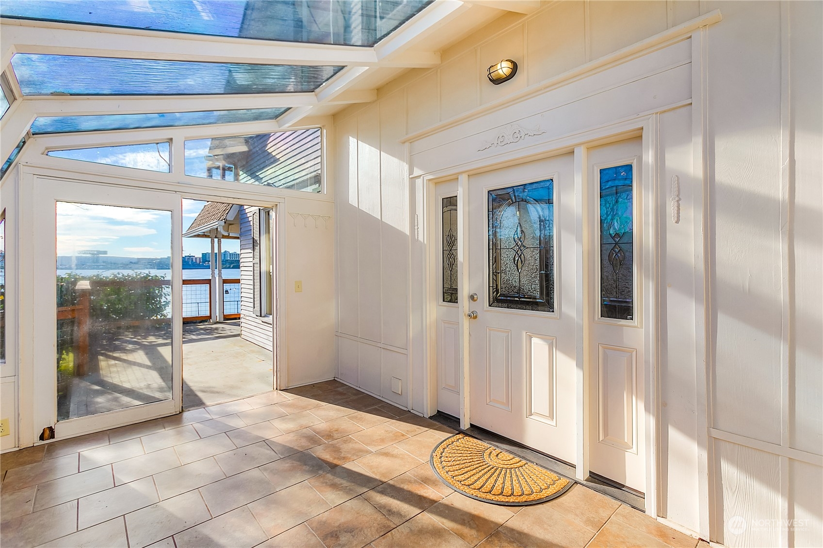 315 Shore Drive Bremerton, WA 98310 - Photo 8 of 38 a view of a hallway with bathroom and outdoor space
