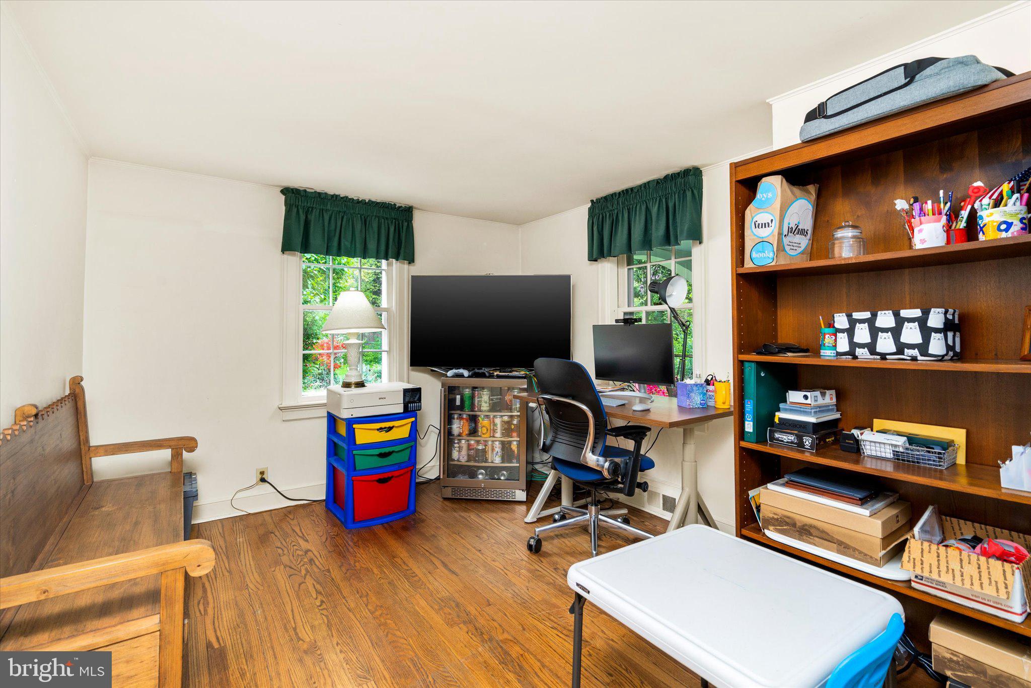 21 Elm Road Princeton, NJ 08540 - Photo 15 of 28 a living room with furniture and a flat screen tv