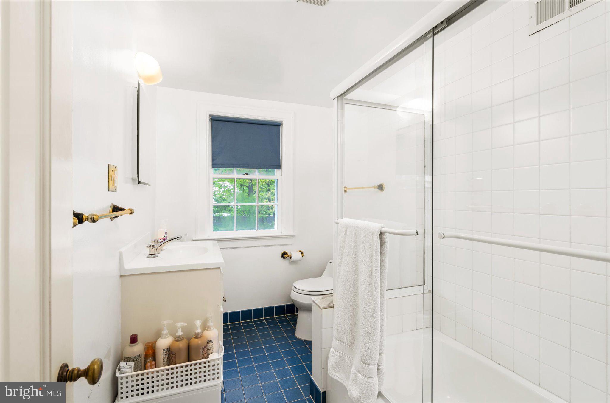 21 Elm Road Princeton, NJ 08540 - Photo 18 of 28 a bathroom with a sink toilet and shower