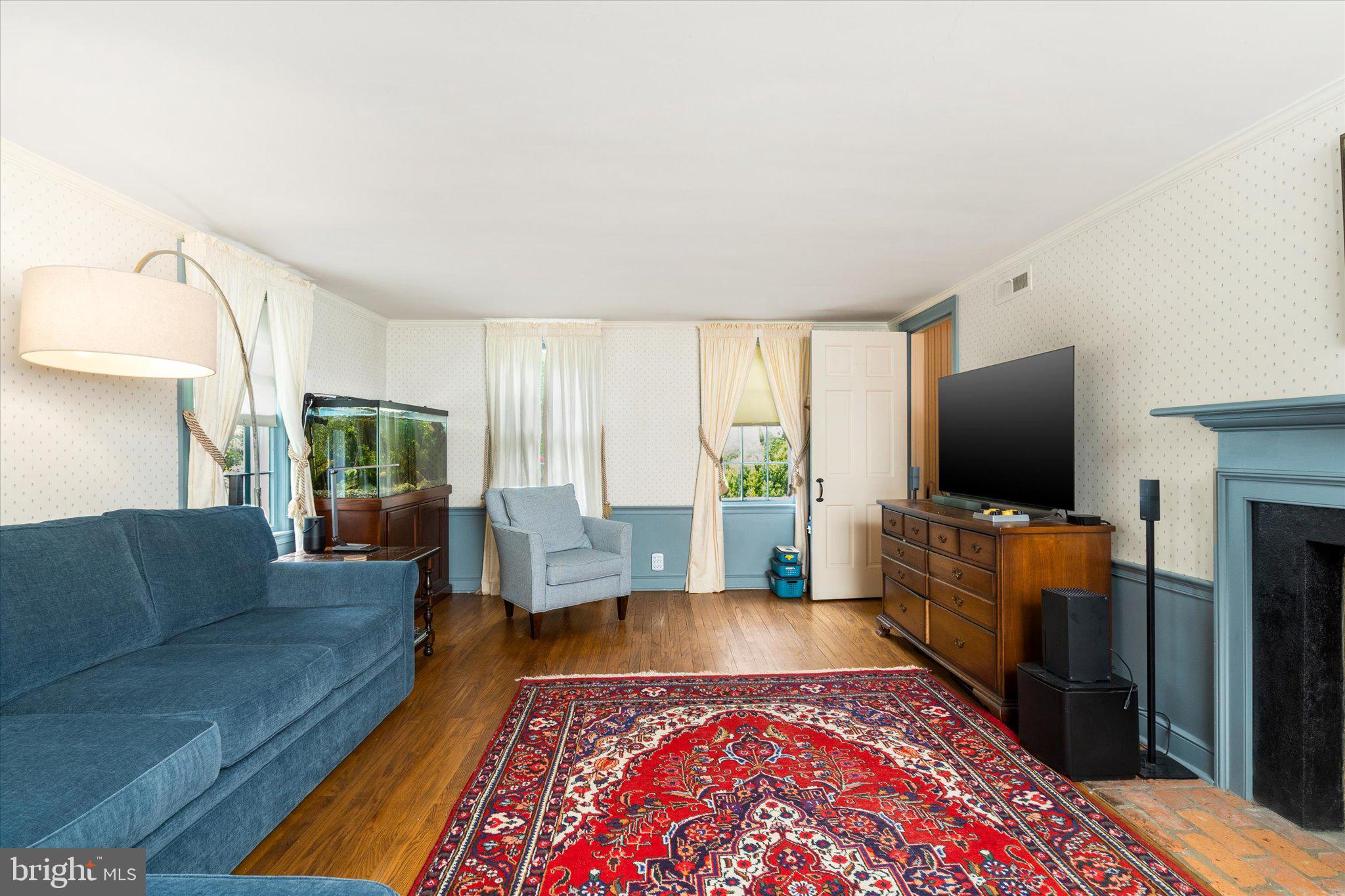 21 Elm Road Princeton, NJ 08540 - Photo 7 of 28 a living room with furniture and a flat screen tv