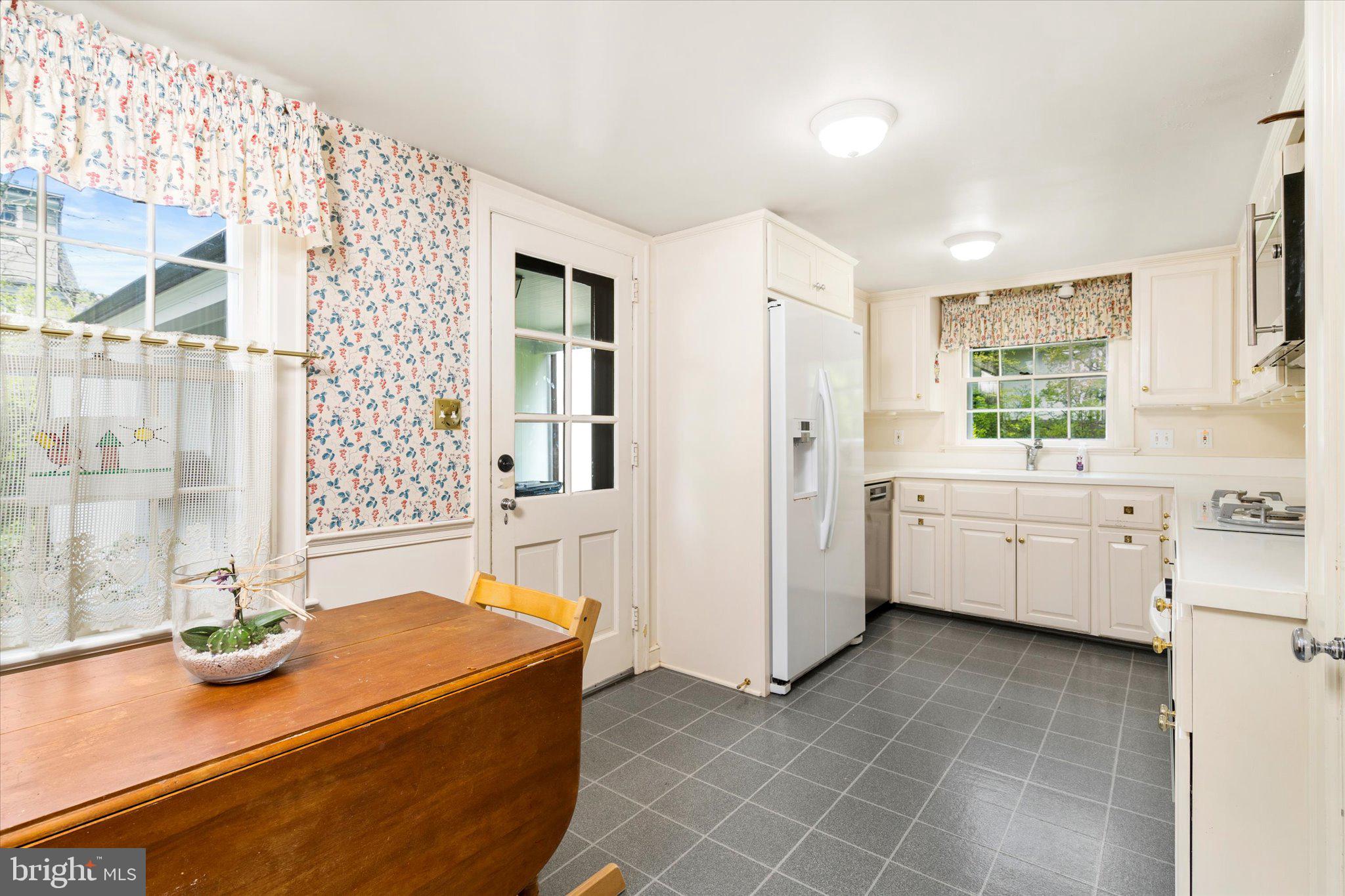 21 Elm Road Princeton, NJ 08540 - Photo 9 of 28 a kitchen with stainless steel appliances granite countertop a sink and cabinets