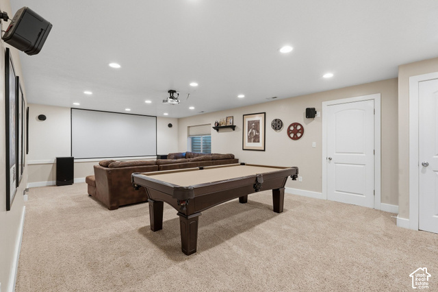 1447 Meadow Lane Mapleton, UT 84664 - Photo 25 of 67 Spacious recreation area featuring recessed lighting, a built-in projection screen, and two panel doors