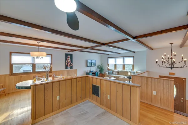 a kitchen with lots of counter space and windows