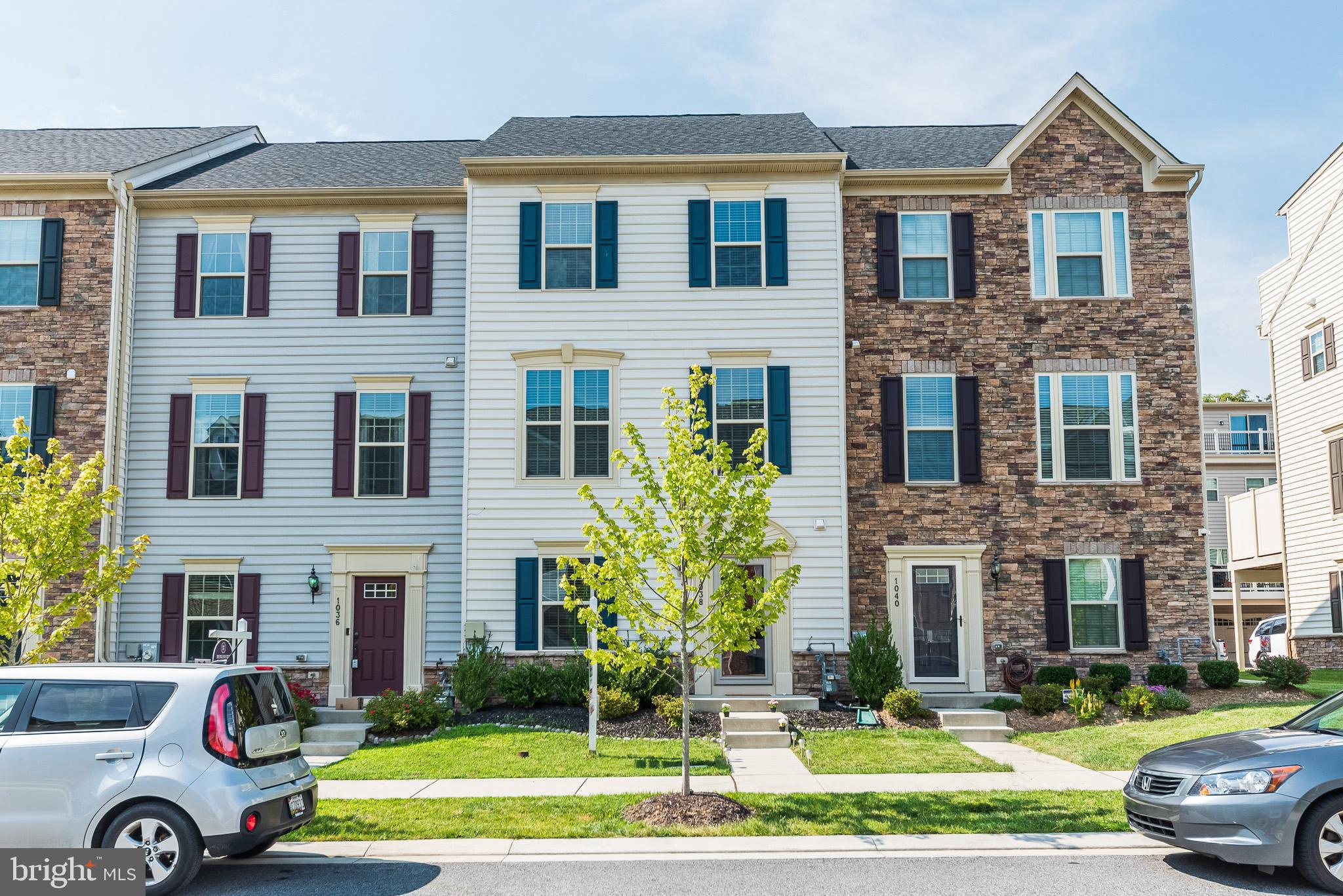 1038 Ramble Run Road Baltimore, MD 21220 - Photo 2 of 47 a front view of a house with a yard