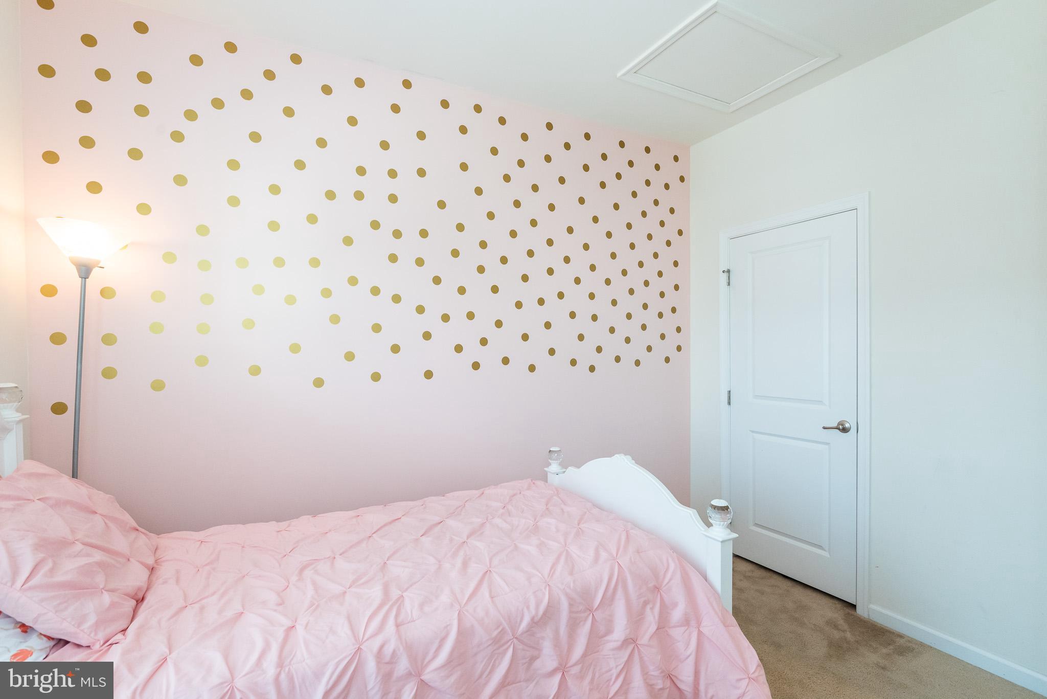 1038 Ramble Run Road Baltimore, MD 21220 - Photo 37 of 47 a bedroom with a bed and a wall painting