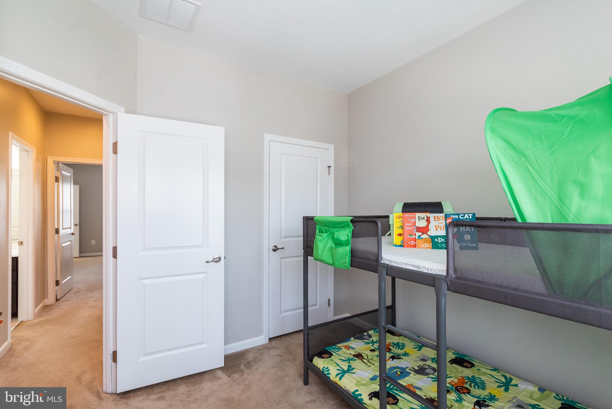 1038 Ramble Run Road Baltimore, MD 21220 - Photo 43 of 47 a room with furniture and a potted plant