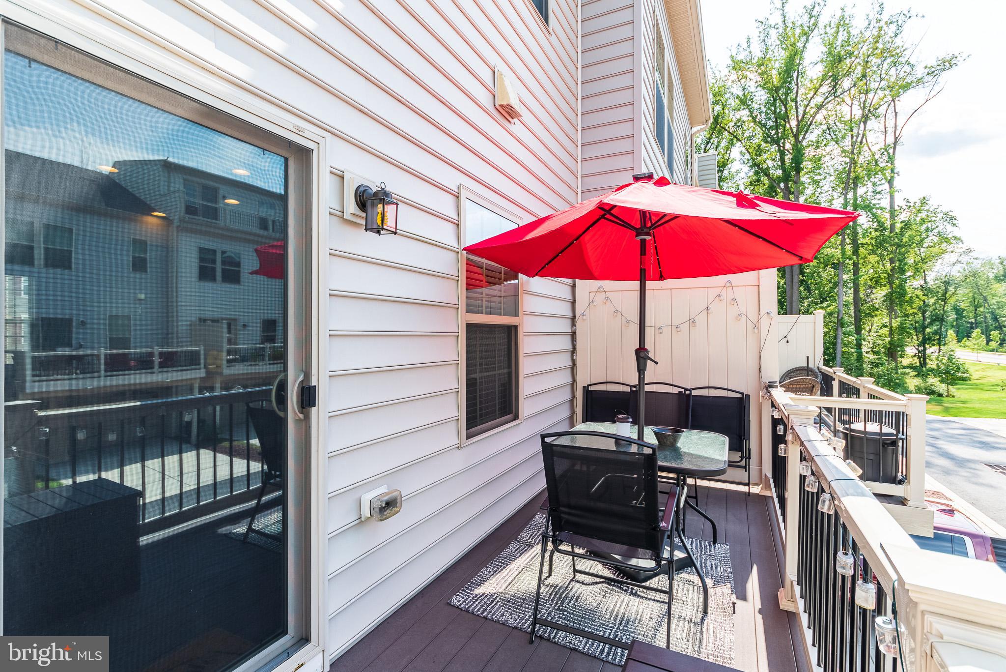 1038 Ramble Run Road Baltimore, MD 21220 - Photo 47 of 47 a patio with a table and chairs