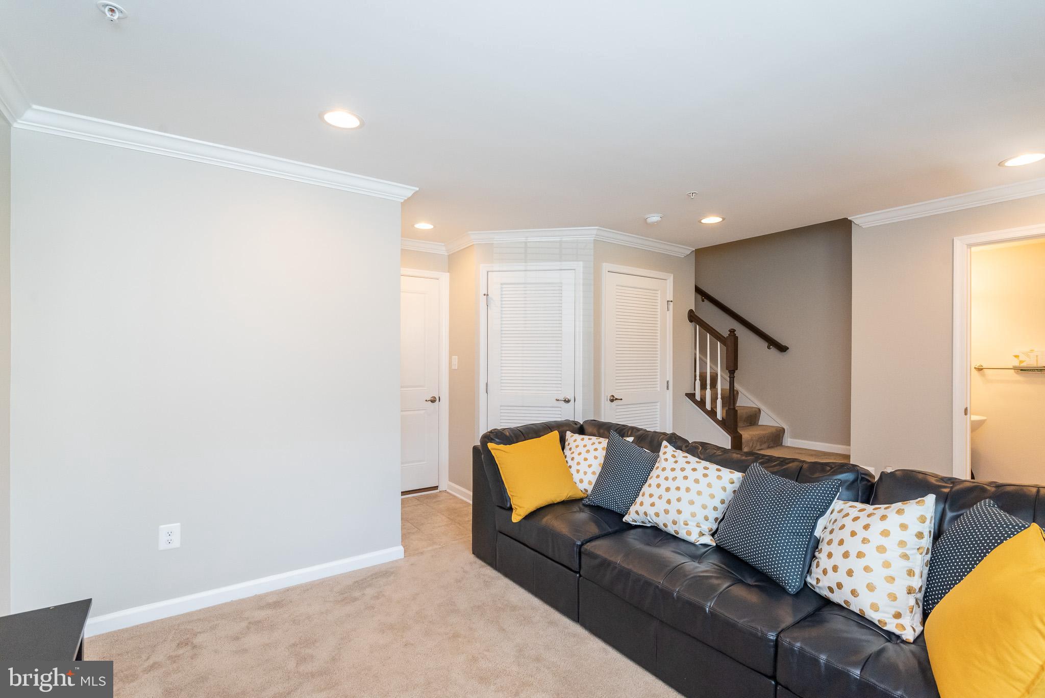 1038 Ramble Run Road Baltimore, MD 21220 - Photo 7 of 47 a living room with furniture and a couch