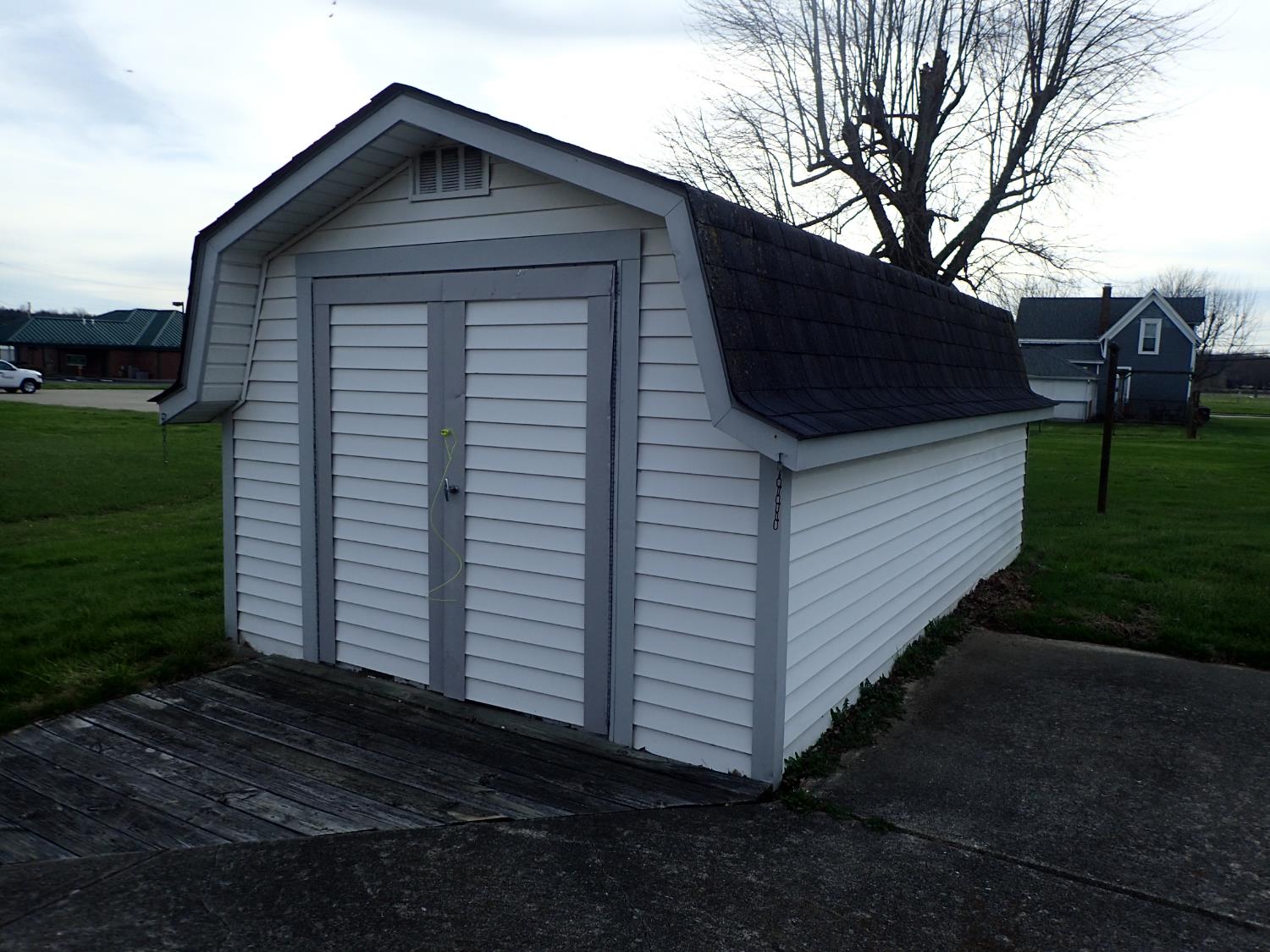 315 Nieman Street Sunman, IN 47041 - Photo 10 of 30 Additional storage shed provides a practical space for tools, lawn equipment, and seasonal items. Conveniently located with easy access, it adds valuable functionality to the property.