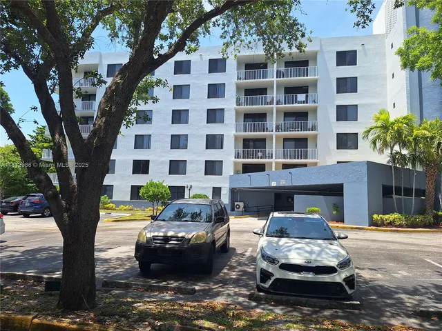 a front view of a building with street view