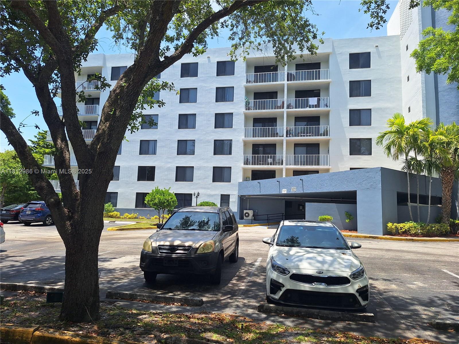 a front view of a building with street view
