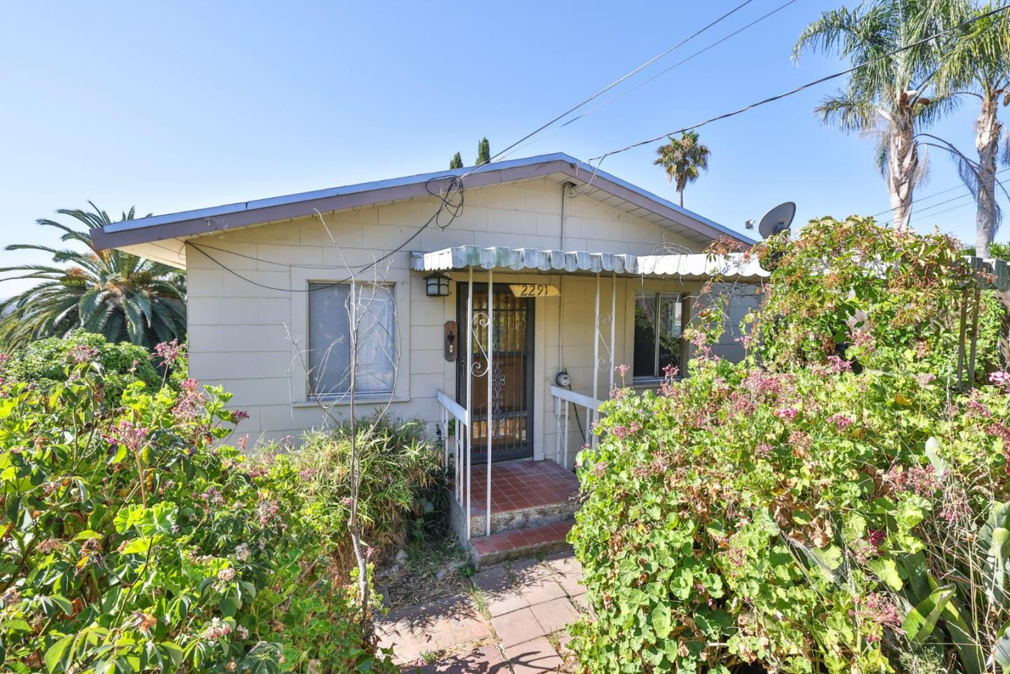 2291 Upland Road San Leandro, CA 94578 - Photo 2 of 32 front view of a house with a small yard