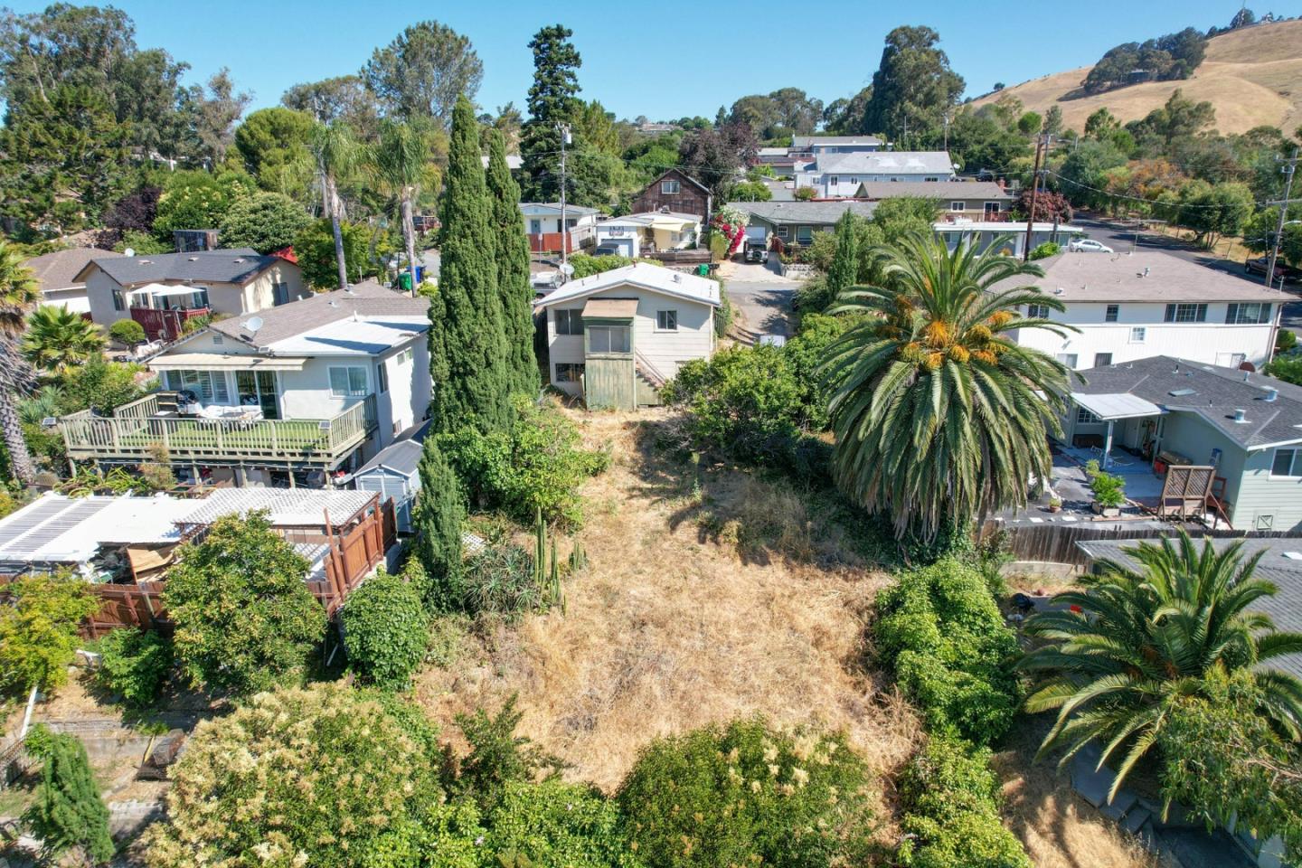 2291 Upland Road San Leandro, CA 94578 - Photo 31 of 32 a picture of houses with outdoor space and seating area