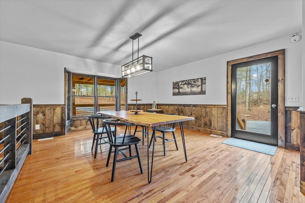 10 Johnson Ford Road Epworth, GA 30541 - Photo 12 of 50 a view of a dining room with furniture window and wooden floor