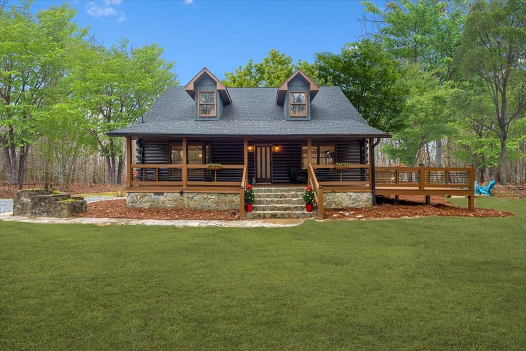 10 Johnson Ford Road Epworth, GA 30541 - Photo 47 of 50 a front view of a house with a garden