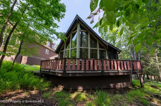 a view of a town with mountains in the background