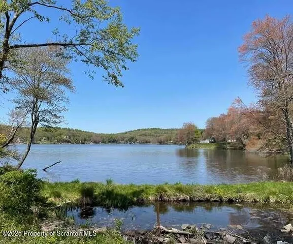 a view of a lake with outdoor space