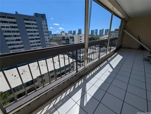 a view of balcony with wooden floor