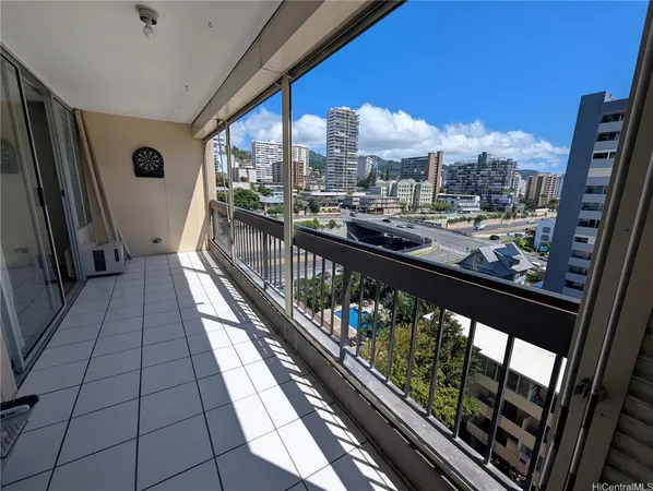 a view of a balcony with wooden floor