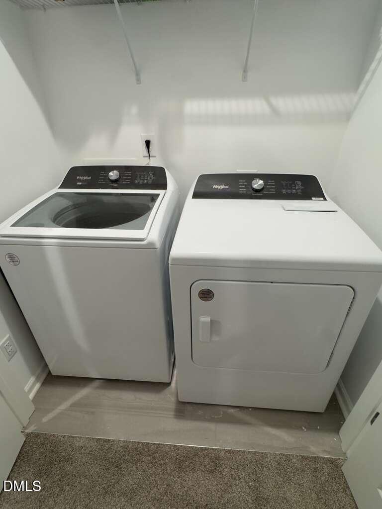 13031 Rover Street Charlotte, NC 28273 - Photo 9 of 29 a utility room with washer and dryer