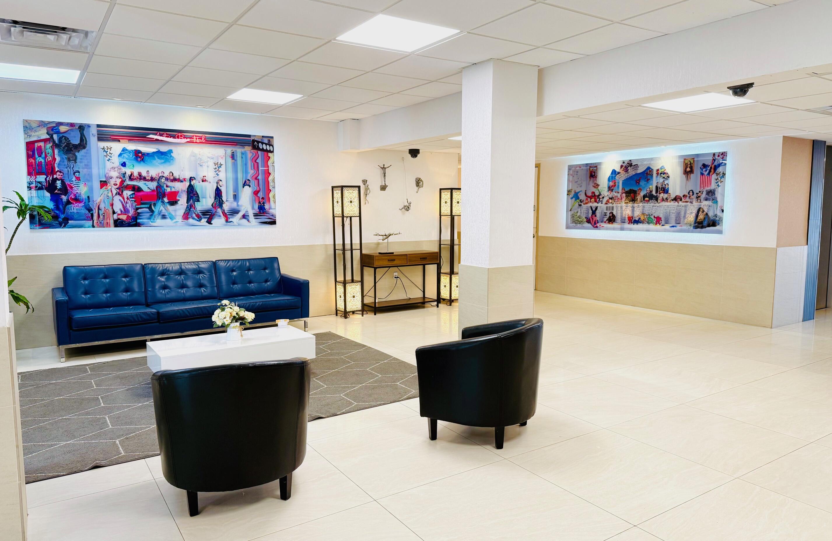 4164 Inverrary Drive, Unit 404 Lauderhill, FL 33319 - Photo 18 of 23 a living room with furniture and a flat screen tv