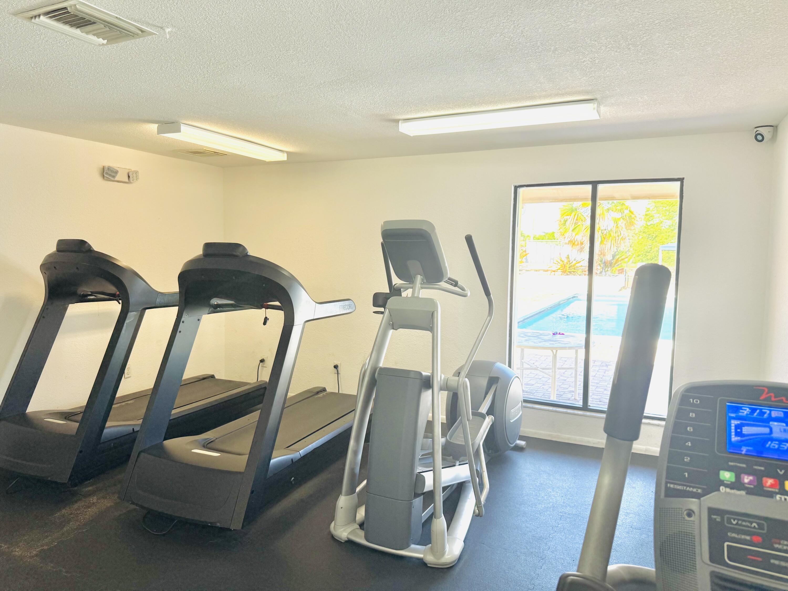4164 Inverrary Drive, Unit 404 Lauderhill, FL 33319 - Photo 21 of 23 a view of a room with gym equipment