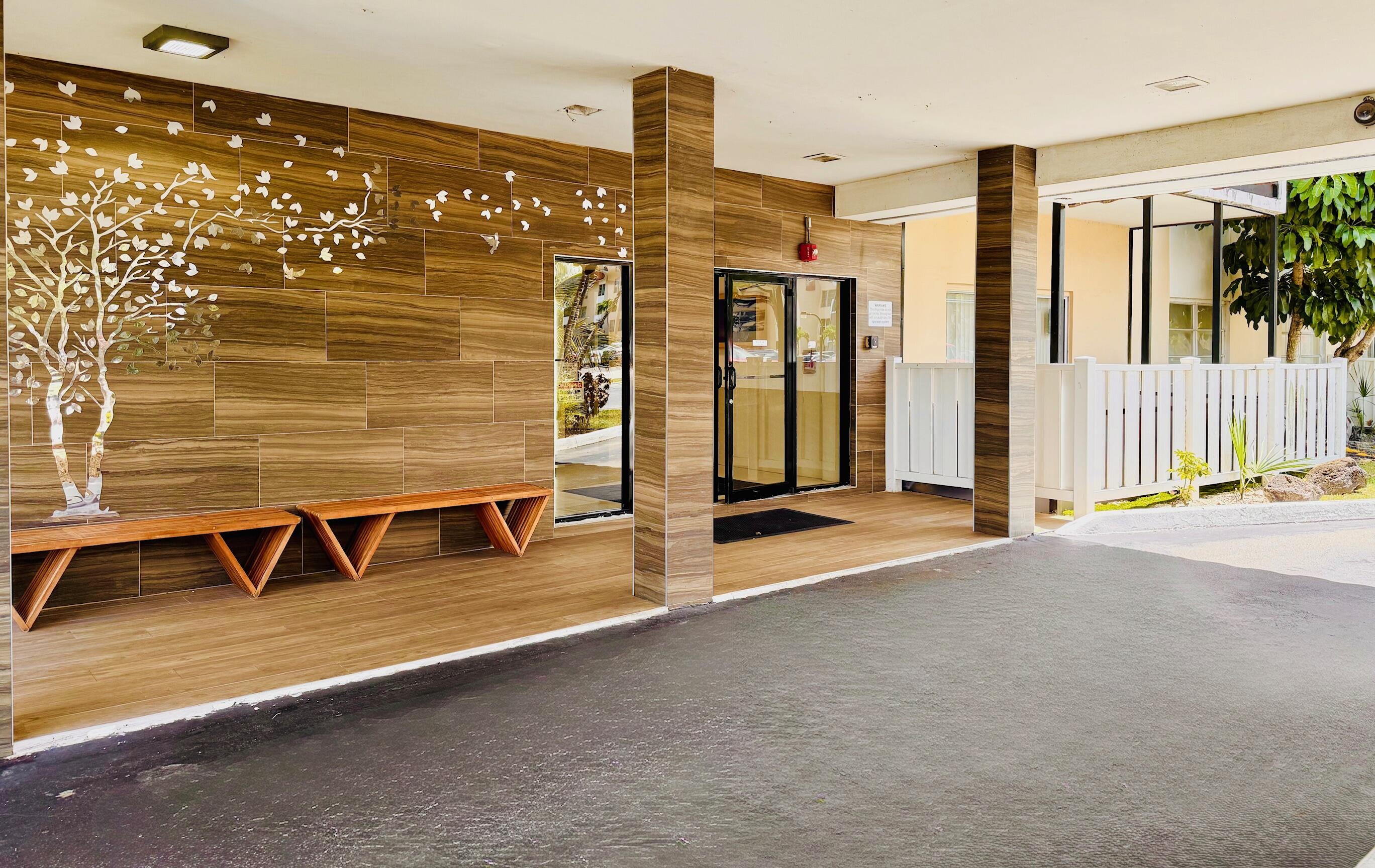 4164 Inverrary Drive, Unit 404 Lauderhill, FL 33319 - Photo 3 of 23 a view of a patio with a table and chair