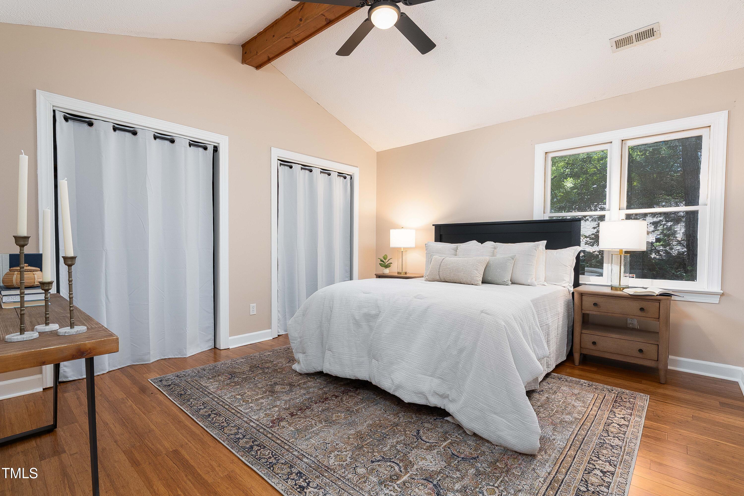 200 West Woodcroft Parkway, Unit 52A Durham, NC 27713 - Photo 11 of 21 a bedroom with a bed and a window