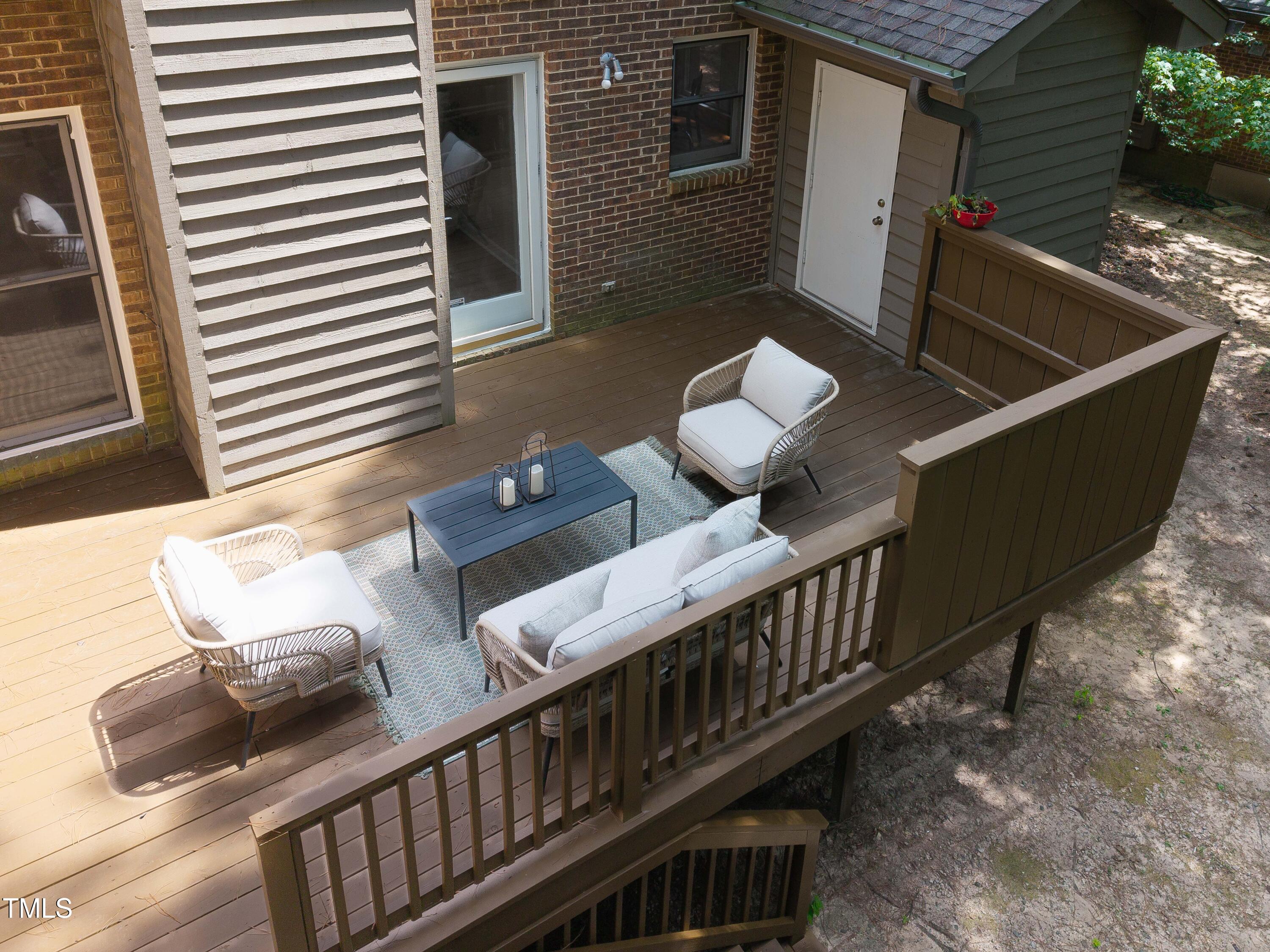200 West Woodcroft Parkway, Unit 52A Durham, NC 27713 - Photo 19 of 21 a view of balcony and deck