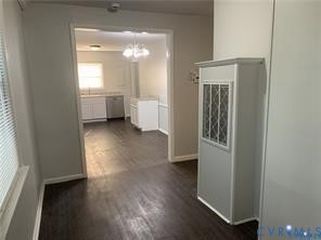 3324 Meadowbridge Road Richmond, VA 23222 - Photo 6 of 36 a view of a room with wooden floor and a window
