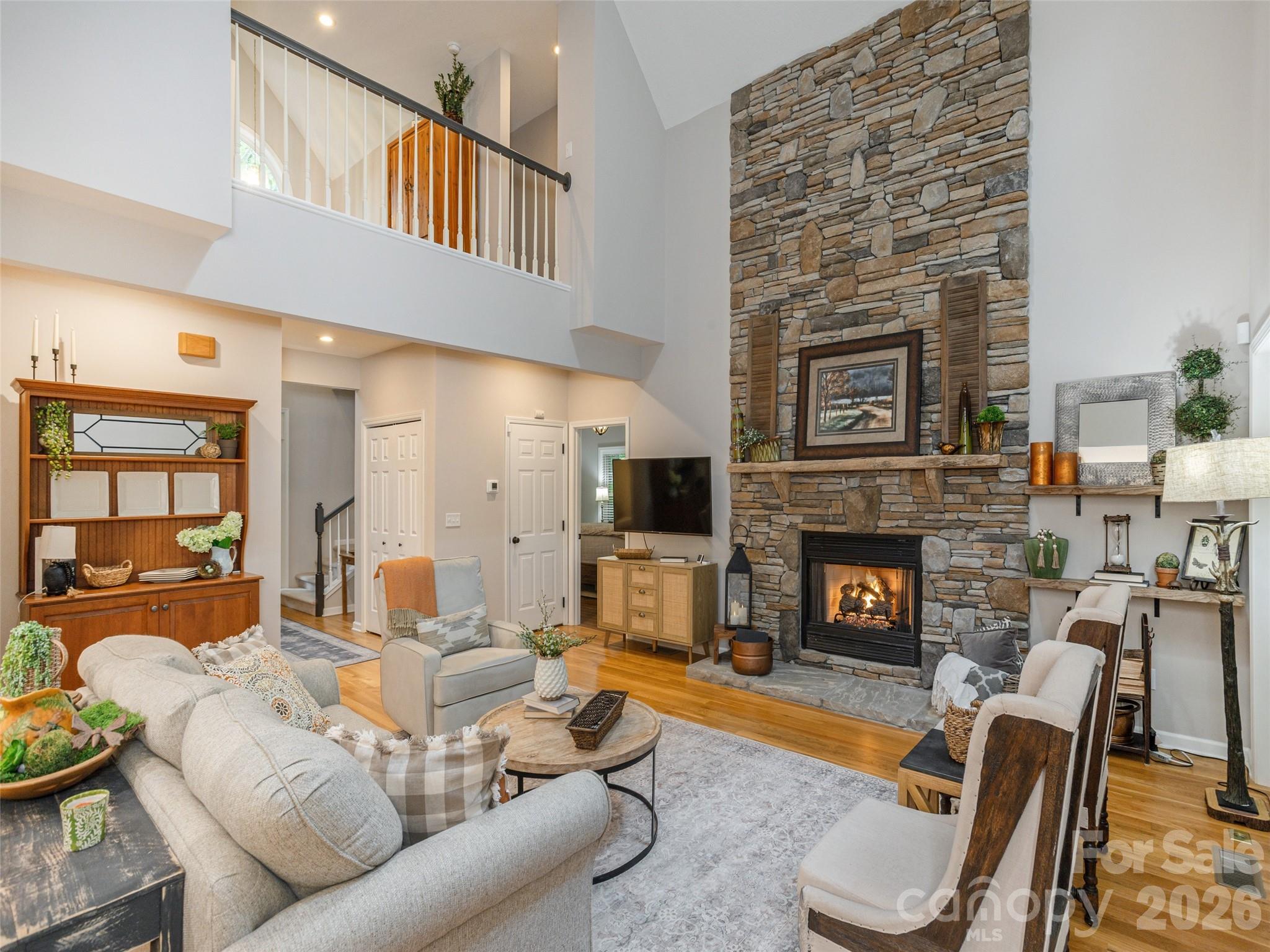 417 Blue Mist Way Arden, NC 28704 - Photo 13 of 48 a living room with furniture and a fireplace