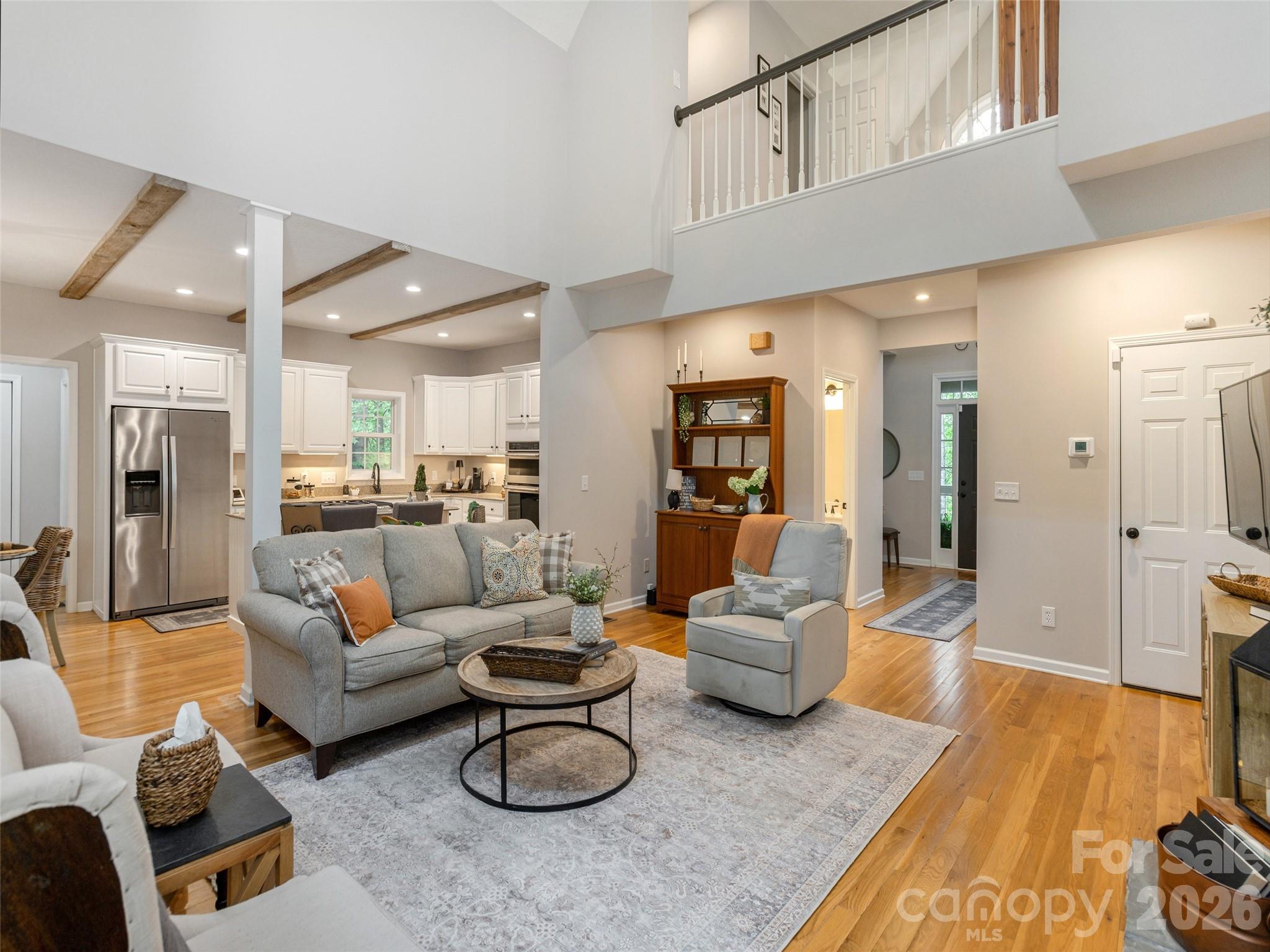 417 Blue Mist Way Arden, NC 28704 - Photo 14 of 48 a living room with furniture and a wooden floor