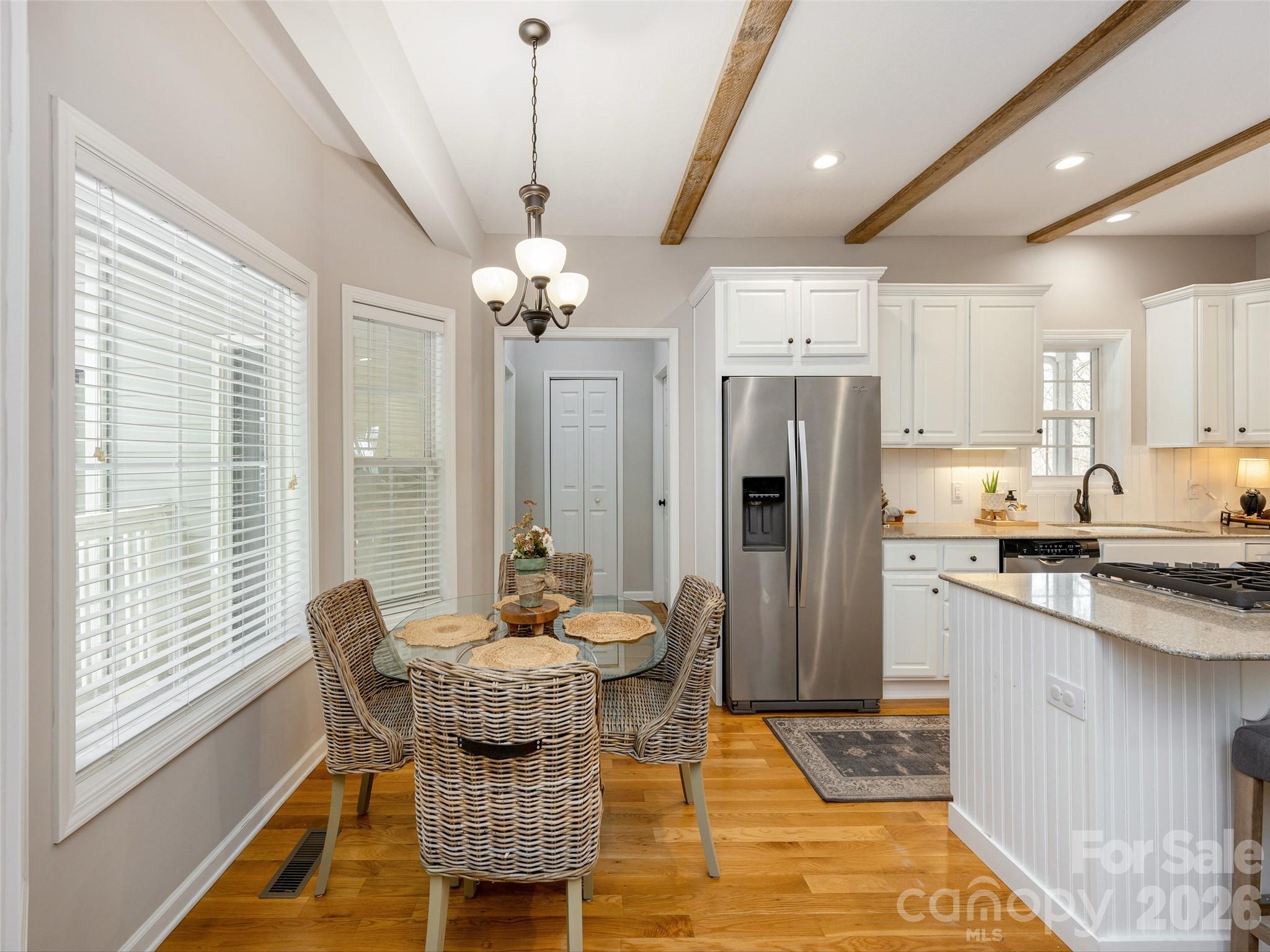 417 Blue Mist Way Arden, NC 28704 - Photo 16 of 48 a kitchen with stainless steel appliances kitchen island granite countertop a refrigerator and a stove top oven